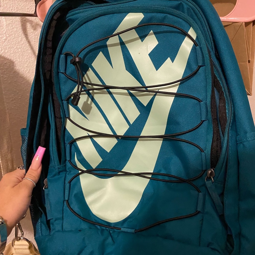 Aqua green with blue nike backpack